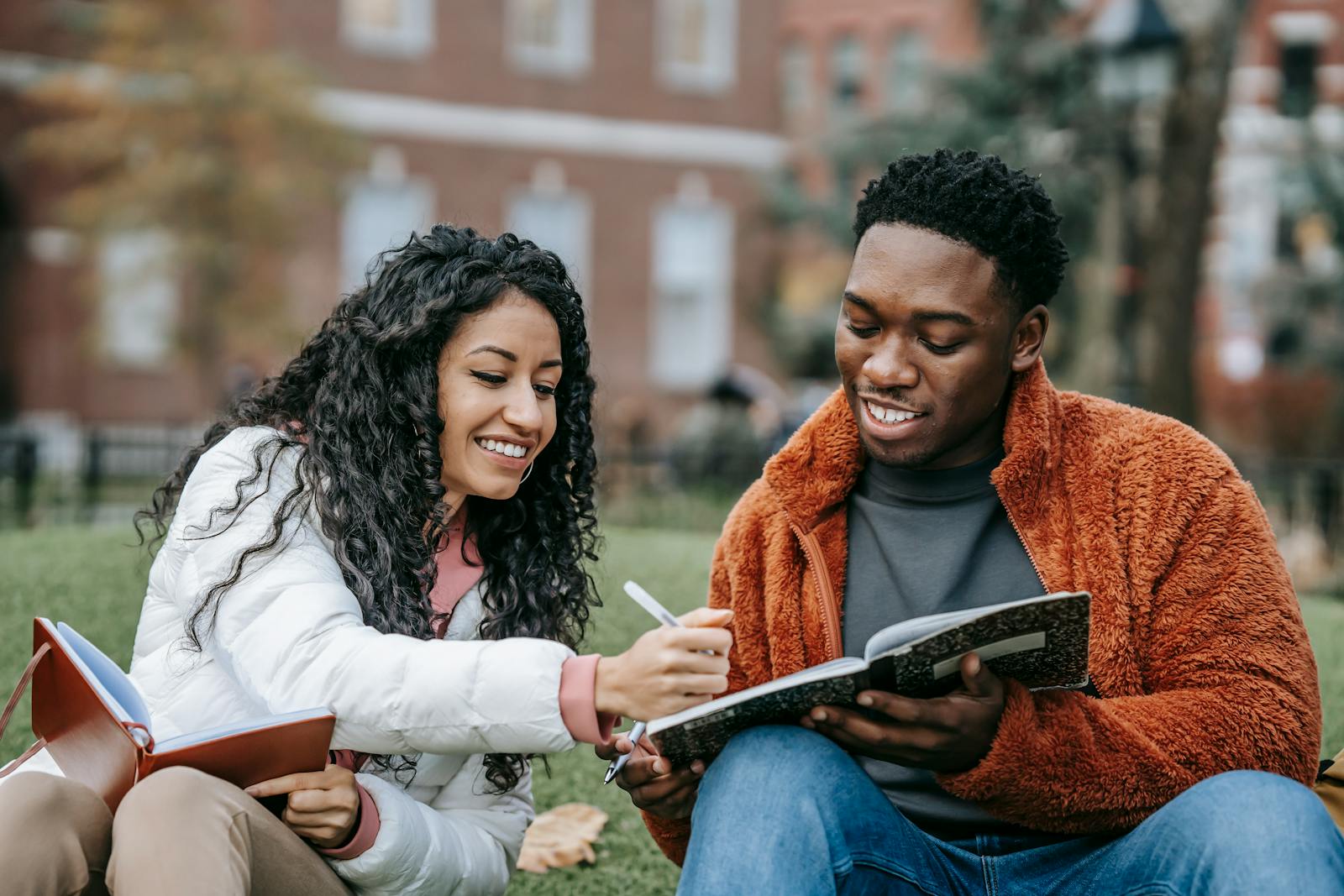 Students reviewing university options together on campus